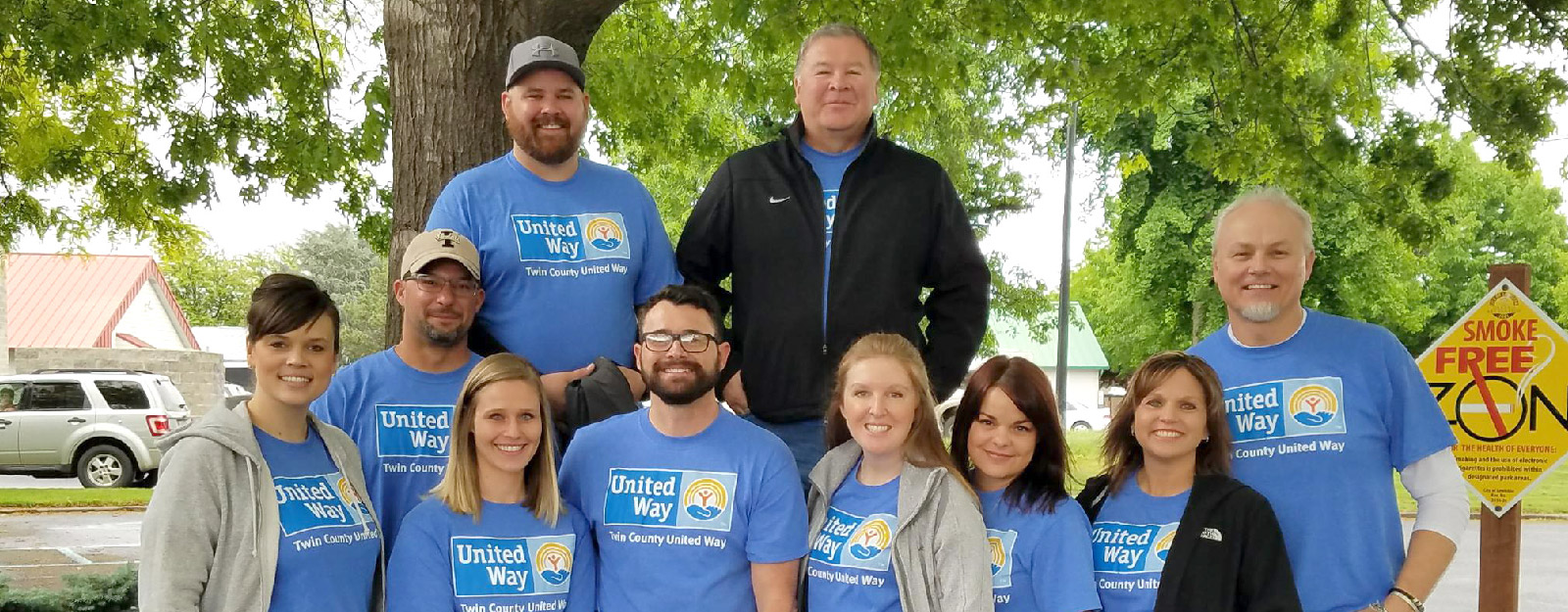 People in United Way teeshirts smiling together