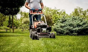 man mowing lawn