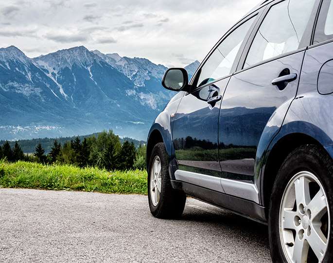 car with mountains