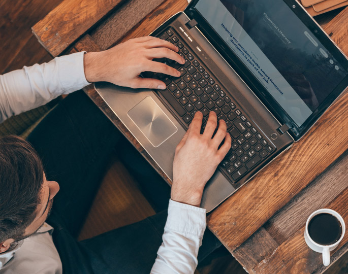 Person typing on laptop
