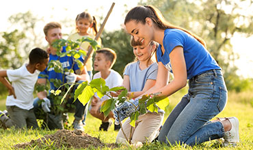 People gardening with children