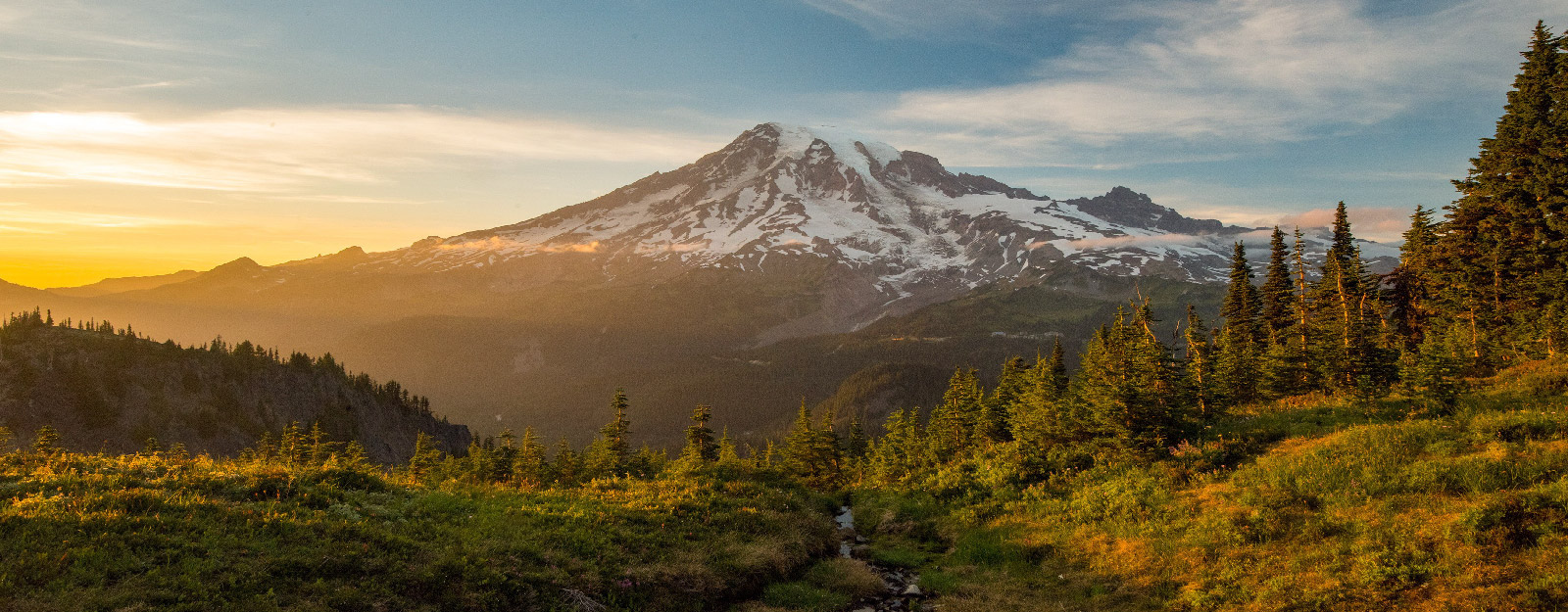 Mountains in forrest at sunset